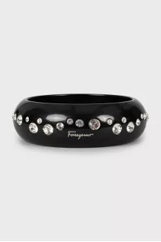 Black bracelet decorated with rhinestones