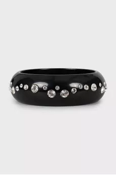 Black bracelet decorated with rhinestones