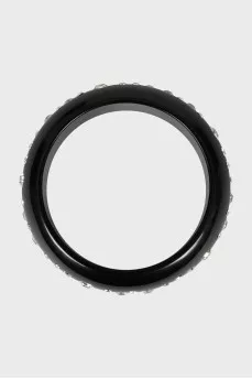 Black bracelet decorated with rhinestones