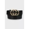 Men's leather belt with gold buckle