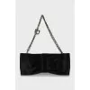 Textile clutch in the form of a bow