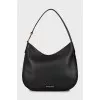 Leather hobo bag with tag