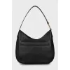 Leather hobo bag with tag