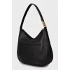 Leather hobo bag with tag