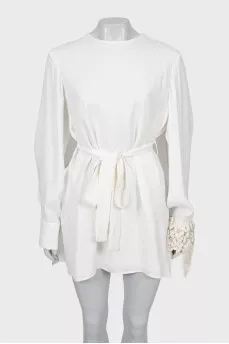 Mini dress with decoration on the sleeves