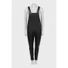 Leather jumpsuit with silver buttons