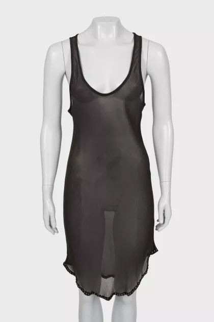 Silk dress with decor at the hem