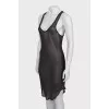 Silk dress with decor at the hem