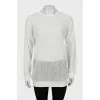 Semi-sheer jumper with eyelet