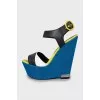 Leather sandals with textile wedge