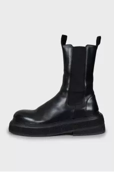 Black leather boots with chunky soles