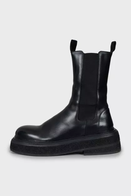 Black leather boots with chunky soles