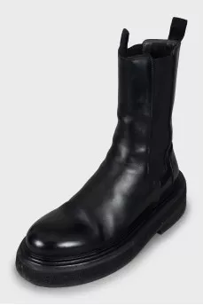 Black leather boots with chunky soles