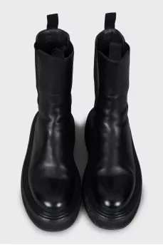 Black leather boots with chunky soles