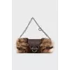 Shoulder bag decorated with fur