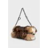 Shoulder bag decorated with fur
