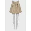 Beige denim mini skirt