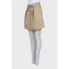 Beige denim mini skirt