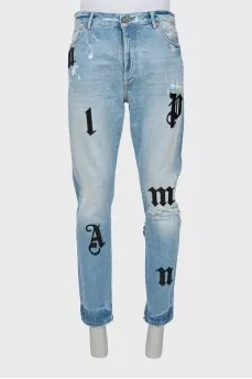 Men's blue jeans with patches
