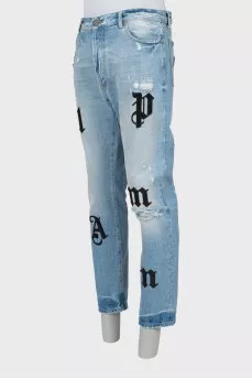 Men's blue jeans with patches