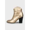 Gold ankle boots with wooden heel