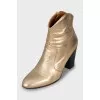 Gold ankle boots with wooden heel