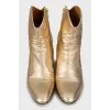 Gold ankle boots with wooden heel