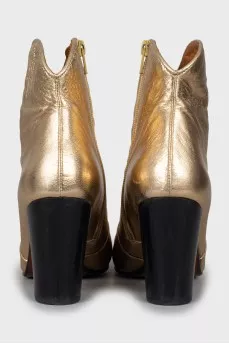 Gold ankle boots with wooden heel