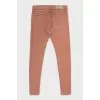 Pink skinny jeans with tag