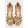 Patent leather shoes with perforations