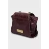 Mini bag with embossed leather