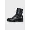 Black leather lace-up boots