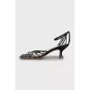 Leather sandals with glass heels