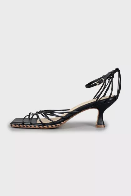 Leather sandals with glass heels