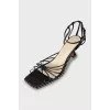Leather sandals with glass heels