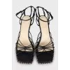 Leather sandals with glass heels