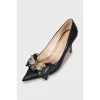 High-heeled leather shoes