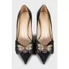 High-heeled leather shoes