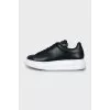 Black leather sneakers