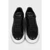 Black leather sneakers