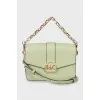 Green bag with gold logo