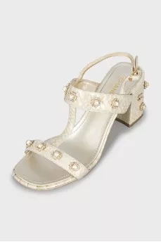 Snakeskin sandals with decor