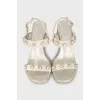 Snakeskin sandals with decor