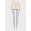 Beige leather shorts