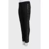 Wool trousers decorated with studs