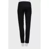 Wool trousers decorated with studs