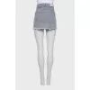 Denim skirt with raw edge