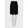 Fitted skirt with seams facing out