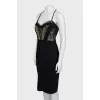 Dress with straps decorated with spikes