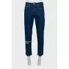 Men's blue jeans with embroidered logo